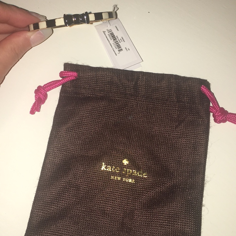 Kate Spade black and gold bow bangle